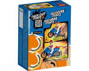 Back of LEGO City 60298 Rocket Stunt Bike box showing stunt bike flywheel action with minifigure, QR code, and multi-language text.