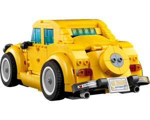 Rear-right view of a yellow LEGO Creator Bumblebee car (10338), showing custom license plate, spare tire, and tail lights.