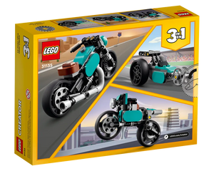 LEGO Creator 31135 Vintage Motorcycle box showing the main motorcycle build and two alternate models: a dragster and a chopper.