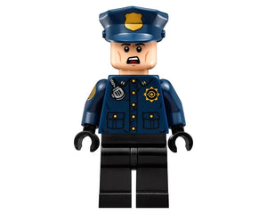 LEGO police officer minifigure from Arkham Asylum, wearing a blue uniform, hat, gold badge, radio, and shoulder patch.