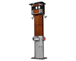 LEGO Super Heroes 70912 Arkham Asylum watchtower, featuring a tall brown and grey structure with loudspeakers and signs.
