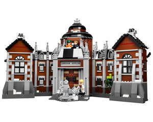 LEGO Super Heroes 70912 Arkham Asylum set, a detailed brown and grey institutional building with a central dome and minifigures.