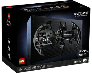 LEGO 76252 Batcave Shadow Box. Black box with a Batman symbol cutout reveals Batcave interior, Batmobile, and minifigures.