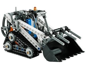 LEGO Technic 42032 Compact Tracked Loader, black and gray with white beams, orange beacon, and front bucket.