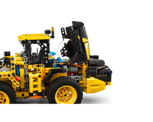 Close-up of LEGO Technic 42209 Volvo L120 Electric Wheel Loader with engine cover open, showing internal details and yellow wheels.