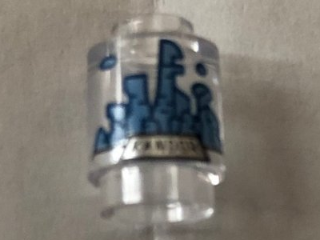 LEGO 3062pb057 - Brick, Round 1 x 1 with Medium Blue and Gold Kandor Skyline Pattern - Image 1
