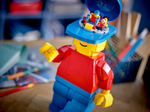 LEGO Sculptures 40649 Up-Scaled LEGO Minifigure, opened cap with minifigure inside
