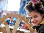 LEGO City 60298 Rocket Stunt Bike, jump through a wooden gear