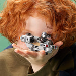 LEGO Star Wars 75321 The Razor Crest Microfighter, child holding the Microfighter