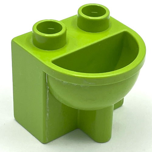 Bright green Duplo furniture bathroom sink, a toy building block with two top studs and a semi-circular basin.
