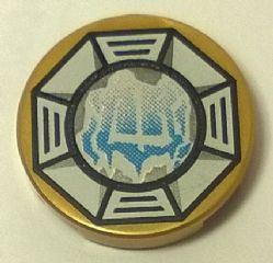 A gold LEGO round 2x2 tile featuring an Airjitzu Ice Symbol in a white octagon pattern on top.