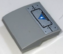 Light bluish gray curved LEGO 2x2 slope brick with silver plate pattern and dark azure triangle warning sign with white lightning bolt.