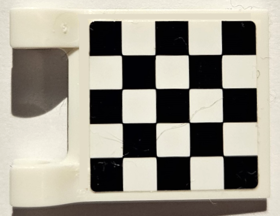 LEGO 2335pb053 - Vlag 2 x 2 vierkant met geruit patroon aan beide zijden, zwarte hoeken (stickers)