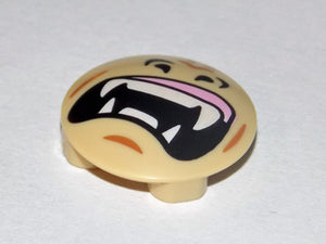 Tan round LEGO 2x2 boat stud plate with a printed pattern of an open gorilla mouth, showing teeth and fangs, with brown markings.