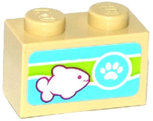 Tan LEGO 1x2 brick with a pet food label featuring a white fish outlined in purple and a white paw print on a blue circle.