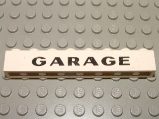 A white LEGO 1x8 brick printed with the word 'GARAGE' in black sans-serif, thick letters, featuring an elaborate 'G'.