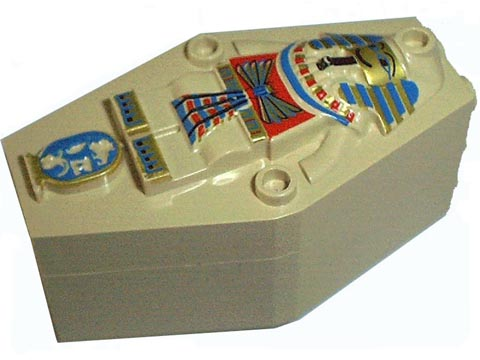 Tan LEGO coffin lid with colorful mummy relief pattern featuring a pharaoh's face and a blue cartouche.