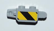 Light gray LEGO 1x2 locking hinge brick, stickered with yellow and black diagonal danger stripes pattern.