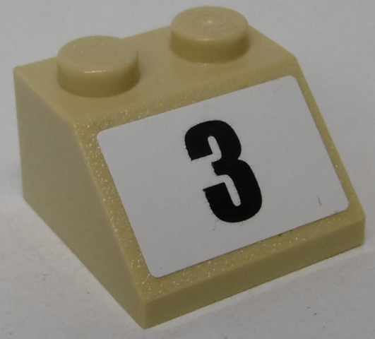 Tan LEGO 3039pb129 Slope 45 2x2 brick with a white sticker featuring a black number 3.
