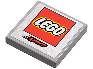 Light gray LEGO 2x2 tile featuring a red LEGO logo and a red 'Kyoto' pattern.