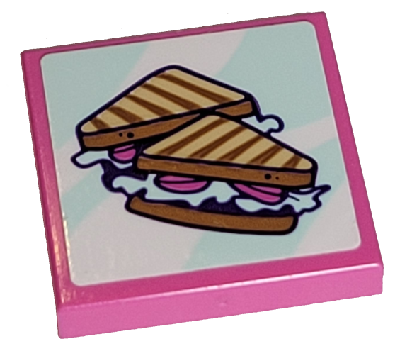 Pink LEGO 2x2 tile with sticker featuring two grilled sandwiches with brown bread, white filling, and pink slices.