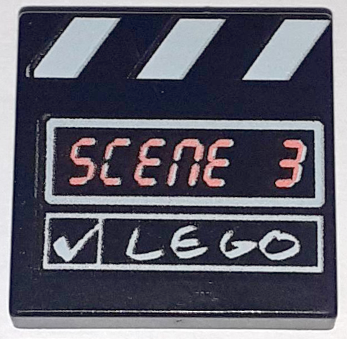 Black LEGO 2x2 tile with film slate pattern, 'SCENE 3' in segmented font, and 'LEGO' with a checkmark.