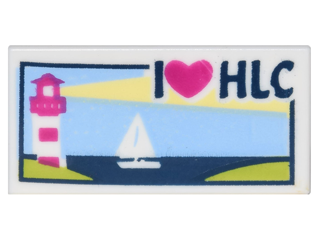LEGO 1x2 tile with a patterned scene: pink and white lighthouse, sailboat on blue water, a yellow light beam, and 'I heart HLC' text.