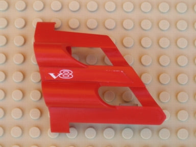 A red LEGO Technic Panel Fairing #2 Large Short, Large Holes, with a white 'V8' pattern.