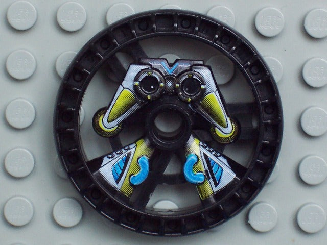 Black LEGO Technic 5x5 disk with a RoboRider Scout robot pattern, featuring yellow, white, and blue details, on a grey baseplate.