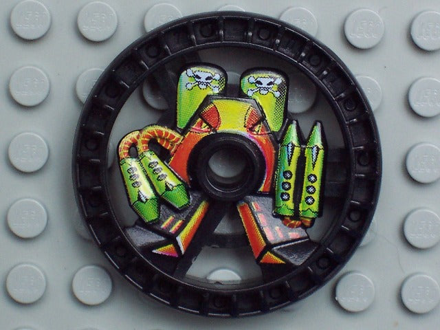 LEGO 32357pb01 Technic 5x5 disk, RoboRider Talisman Wheel Toxic Mold pattern with skulls, missiles, on gray baseplate.