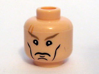 LEGO minifigure head, light flesh, with cheek lines, chin dimple, stern dark tan eyebrows, and a scar above the right eye.