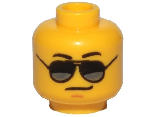 Yellow LEGO minifigure head with black and silver sunglasses, a medium nougat chin dimple, and a smirk pattern.