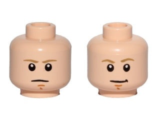 Two light tan LEGO minifigure heads, one stern and one smiling, both with dark tan eyebrows, white pupils, and a chin dimple.