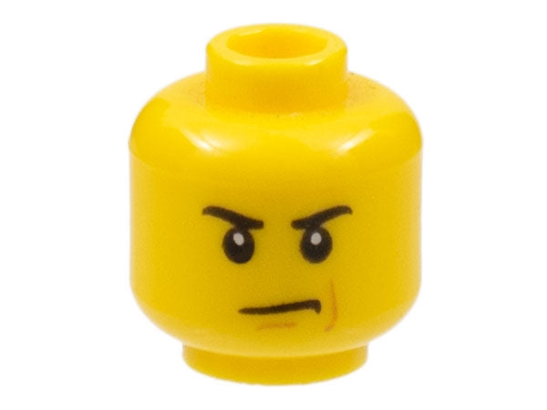 Yellow LEGO minifigure head with angry eyebrows, scowl, and reddish-brown line pattern on the left cheek.