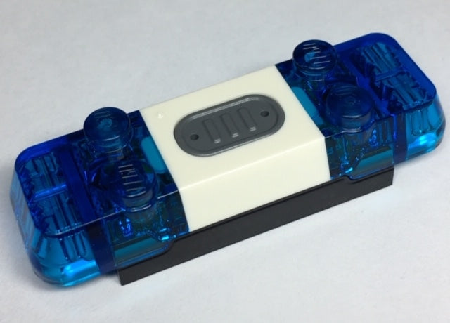 LEGO 40931c01 electric siren with trans-dark blue lights, white center, and grey button, on a black base.