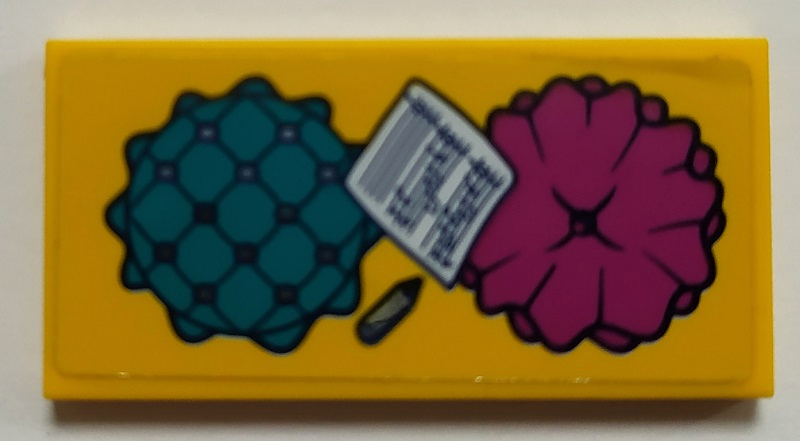 Yellow LEGO 2x4 tile with sticker of dark turquoise and magenta pillows, sheet music, and a pencil.