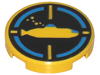 Round yellow LEGO tile with a black background pattern featuring a yellow submarine, bubbles, and a blue crosshair design.