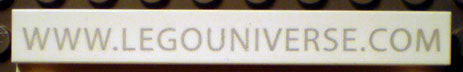 White LEGO 1x8 tile 4162pb038 with 'WWW.LEGOUNIVERSE.COM' pattern printed in thin gray font.