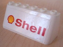 LEGO 4176pb07 white sloped brick featuring a Shell logo and text as a sticker, used in sets 3308 and 3309.