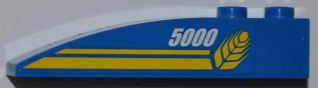 Blue LEGO curved slope with 2 studs, white '5000', yellow wheat spike and lines pattern on the left side.