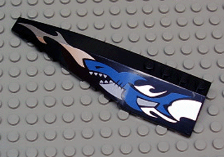 Black LEGO Wedge 12 x 3 Left (42061px5) with a blue shark and silver wave pattern.