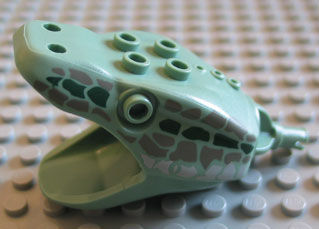 LEGO 43746pb01 Serpent Basilisk Head in light green, with dark gray, dark green, and light gray scales pattern.