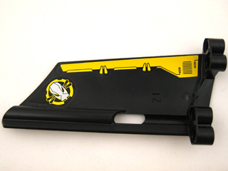 Black LEGO Technic Panel Fairing #21, Large Long, with yellow border stripe and a yellow circle featuring a silver robot head.