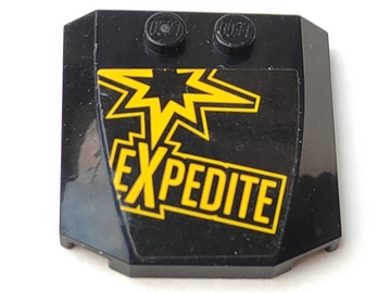 Black LEGO 4x4x2/3 triple curved wedge brick with two studs, featuring a yellow graphic with a starburst and the word 'EXPEDITE'.