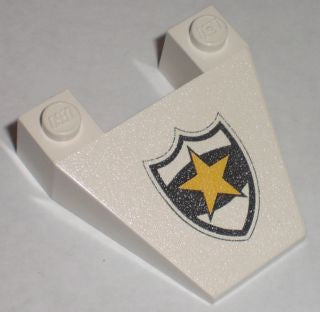 White LEGO 4x4 tapered wedge brick with a black-bordered shield featuring a yellow star, resembling a police badge.