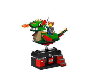 LEGO 5007428 Dragon Adventure Ride: green dragon breathing fire, with a knight minifigure holding sword and shield on a black display base.