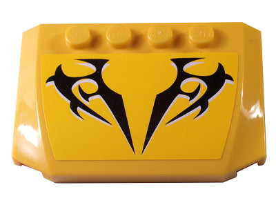 Yellow LEGO 4x6x2/3 triple curved wedge brick with black and white tribal pattern sticker on its front.