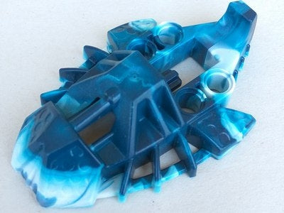 LEGO Bionicle Toa Inika elliptical foot, part 53549pb01, with marbled dark blue and white pattern on white.