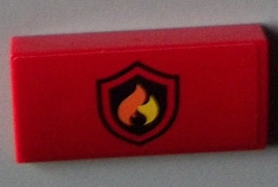 Red LEGO Slope, Curved 2 x 4 x 2/3 piece with a black and yellow fire logo badge pattern.