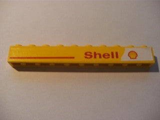 Yellow LEGO brick 1x10 with a red line and 'Shell' text and logo pattern on the right side.
